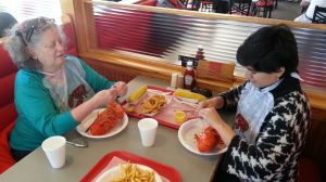 At Plimoth, trying some fresh boiled lobster! Yum!