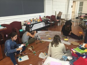 Playing around with art supplies in a maker space focused on art and healing