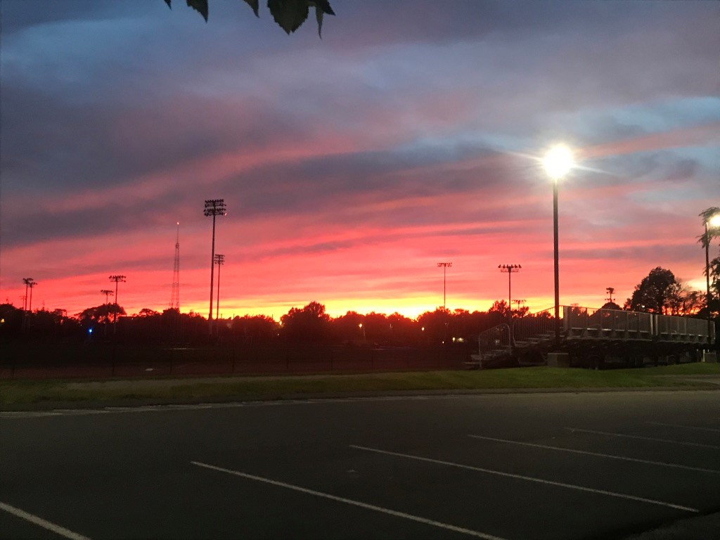 A beautiful sunset over the Harvard outdoor track