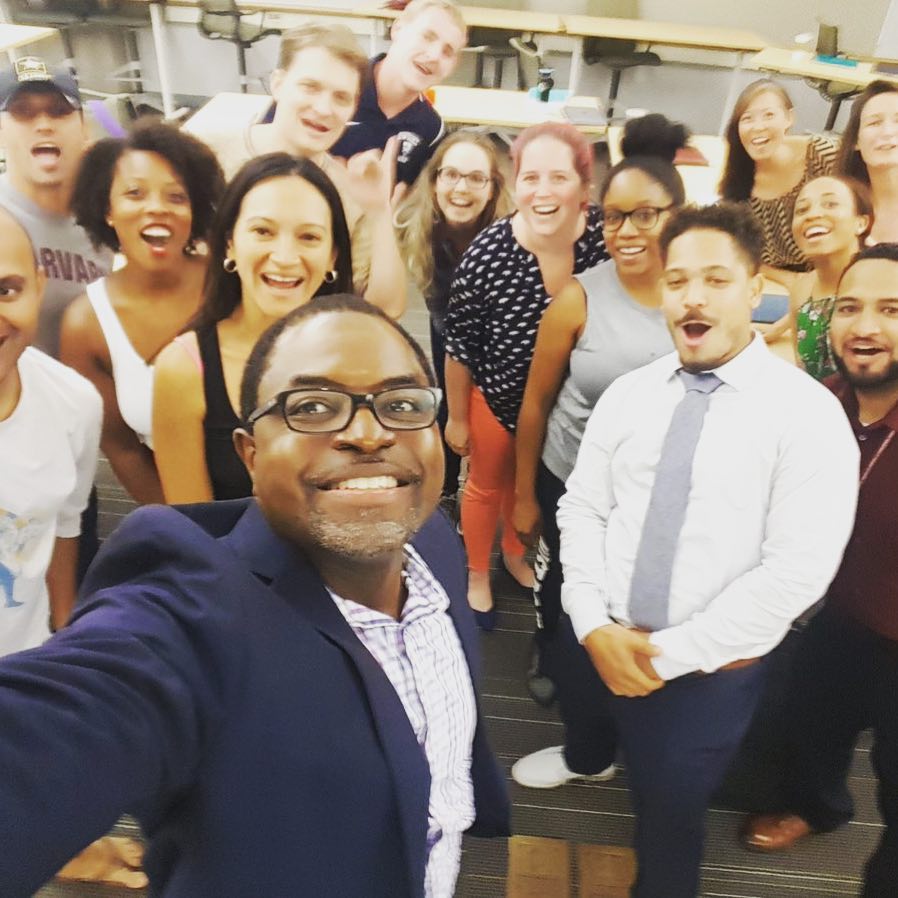 A selfie with students and a faculty member