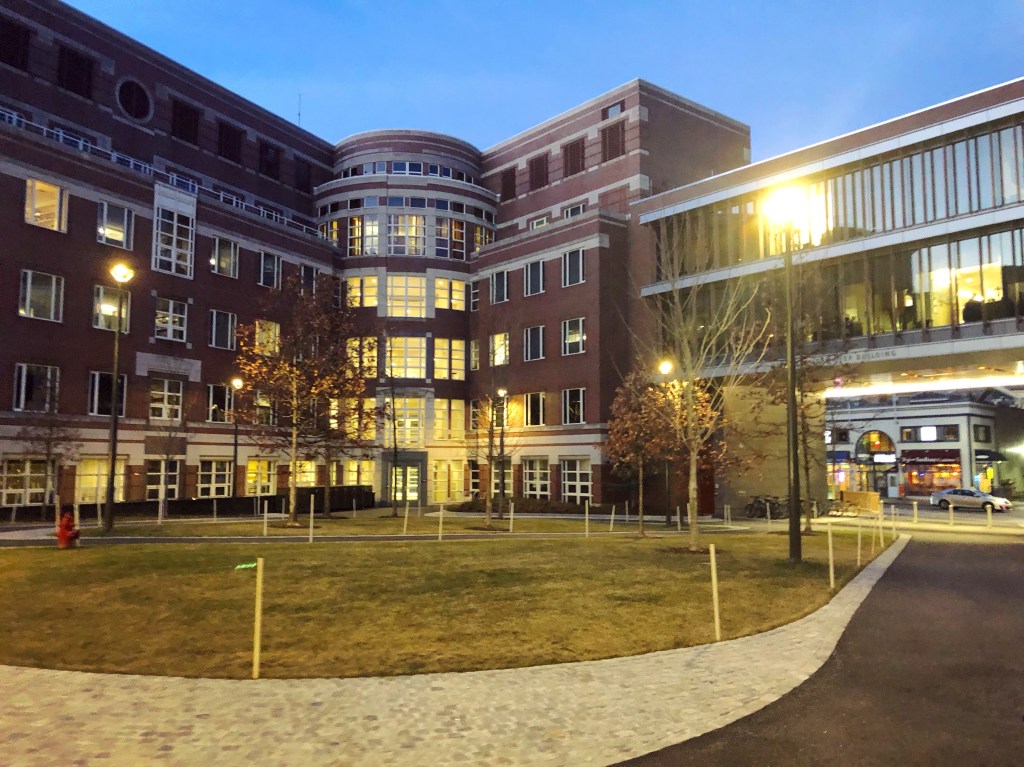 The outside of the Harvard Kennedy School in the evening