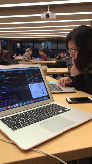 A screen with computer coding in Gutman library