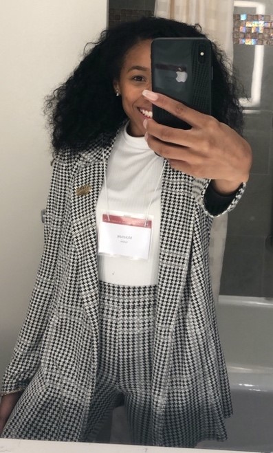 A person talking on a cell phone
Description automatically generated