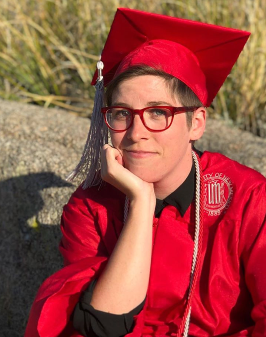 A person wearing a hat
Description automatically generated